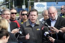 AMWU's Dave Oliver (left), AWU's Paul Howes, ETU National Secretary Peter Tighe (right) at Port Kembia Steelworkers, August 22, 2011.  Photo: Illawarra Mercury.