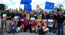 26 July Protest in Mississauga (CAW President Ken Lewenza, kneeling, center, giving an early prompt how strike would end)