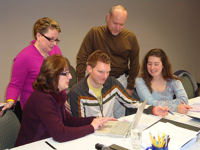 The District 143 negotiating committee prepares for a bargaining session.(L-R) Sandy Field, Bea Knott, Jeff Tobius, Joe Shultz and Kiana Peacock. 