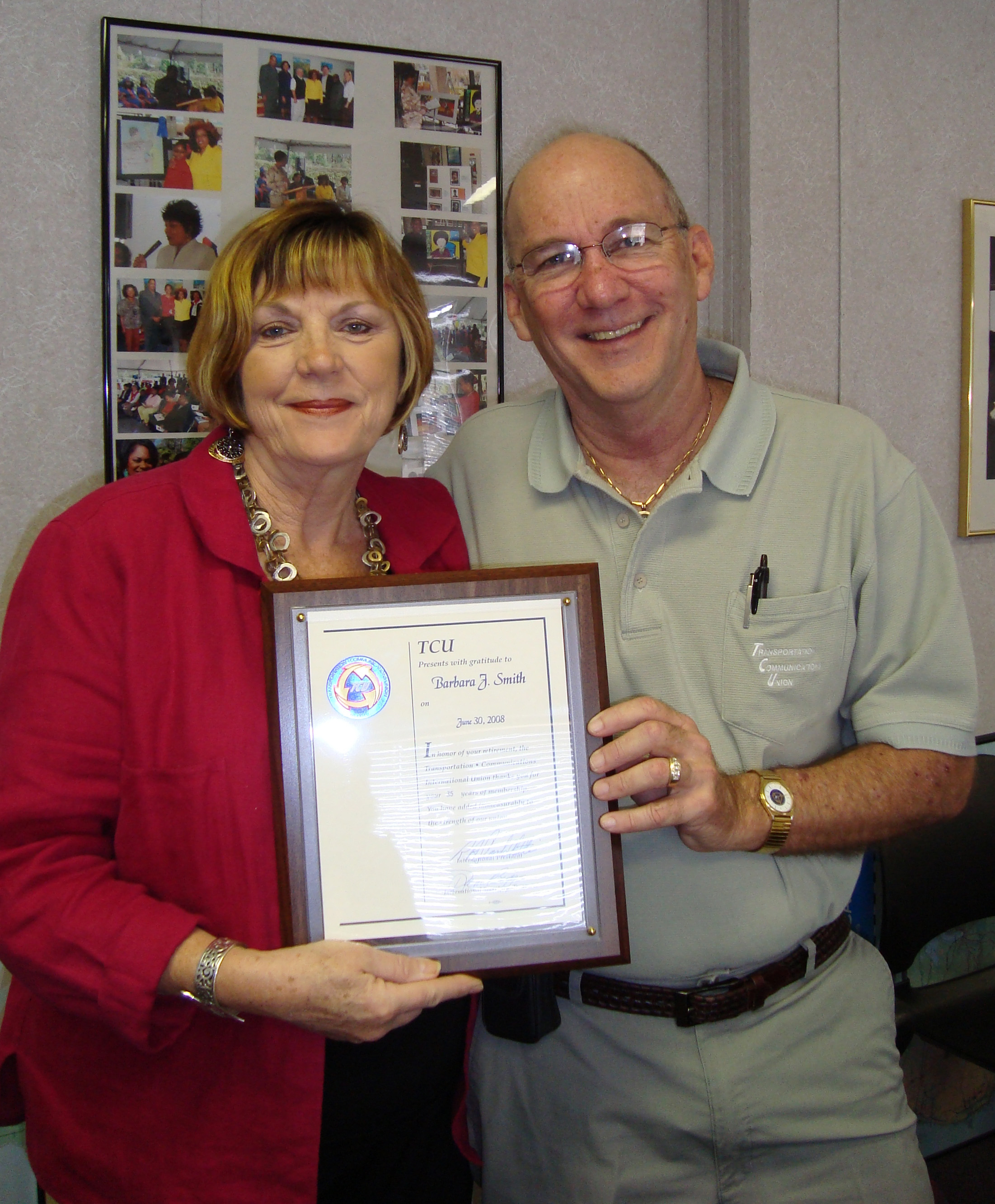 Barbra Smith receiving retirement plaque from Local Chairman N  White Jr.JPG