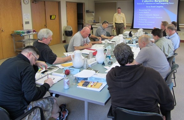 Members participating in a mock bargaining session at the Winpisinger Center.