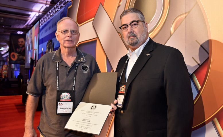 IAM Local 66 retiree Doug Curler, left, stands with IAM International President Bob Martinez at the IAM Newsletter and Website Contest awards ceremony held at the 39th IAM Grand Lodge Convention in Chicago. 