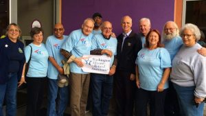 Rep. Adam Smith, middle in black, joins IAM members from the Washington State Alliance of Retired Americans. From left, Pam Harris (IAM), Gwen Rench (Retired Public Employees Council of Washington, RPEC), T.J. Seibert (IAM), Carl Schwartz (IAM), Claude Burfect (RPEC), Jim Hutchins (IAM), Rep. Smith, Ron McGaha (IAM), Jackie Boschok (IAM and Washington Alliance President), Don Bennett (Letter Carriers) and Kathy Wallentine (Washington Education Association).