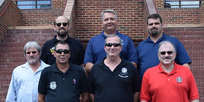 The Clarksville, TN Local 1296 Negotiating Committee completed the Negotiation Prep program at the Winpisinger Center. Front row, from left: Dale Redman, Vice President Richard Steeley, President Ernest Epps and Recording Secretary Earl Keith Jackson. Back row, from left: IAM Collective Bargaining Director Craig Norman, District 711 Business Representative Keith McFarland and Trustee Billy Givens.