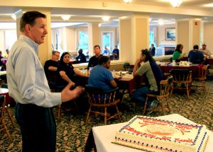 Winspisinger Center Director Chris Wagoner speaks to members attending classes at the Harbor during a recent ceremony making the Center’s 35th anniversary.