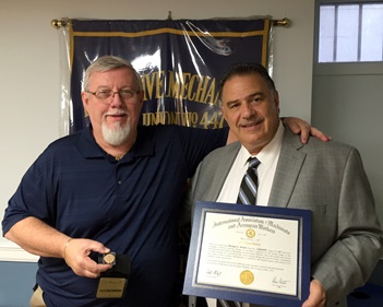 IAM Retiree Mike Walsh, left, receives his 50 year pin and certificate from Eastern Territory General Vice President Jimmy Conigliaro, Sr.