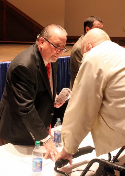 IAM Midwest Territory Gruber helps out at the registration table