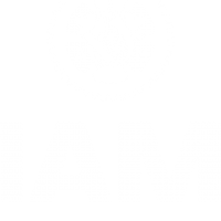 IAMLogo_CA_FR_Vert_Tagline_1Color_White