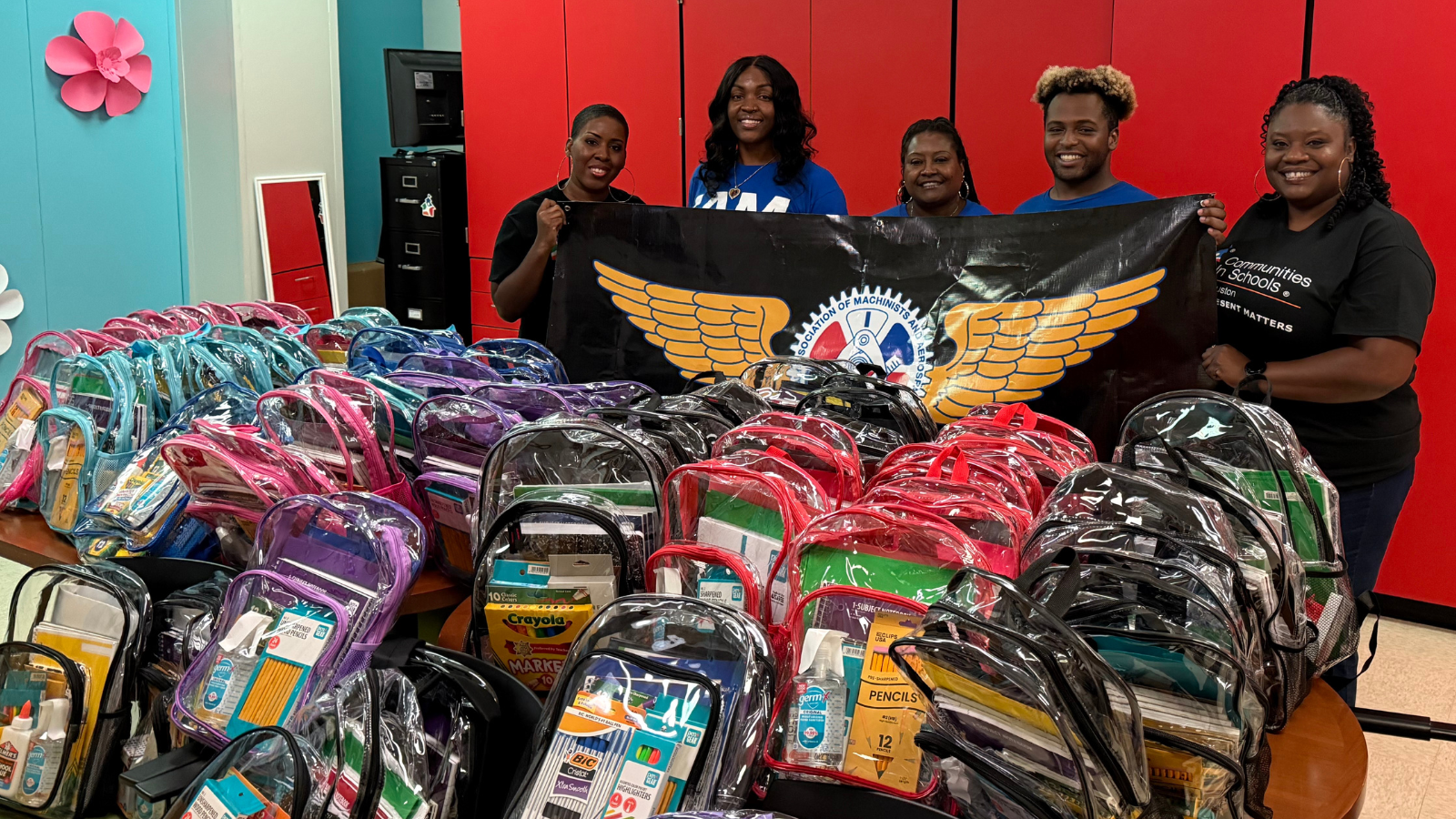 IAM Union Local 2198 Young Workers Committee Delivers Backpacks and Hope to Houston Students